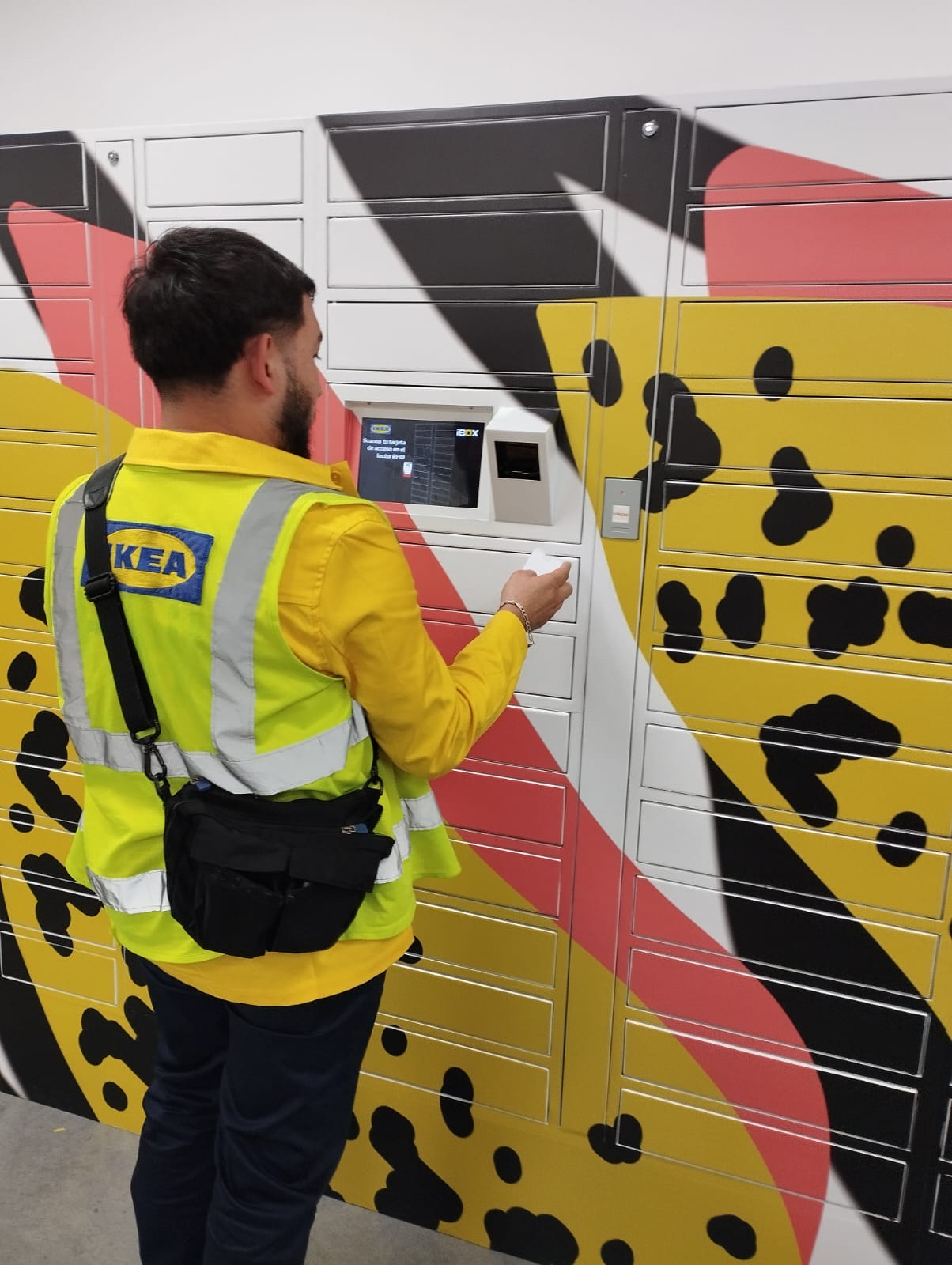 Person interacting with AssetBox intelligent locker system